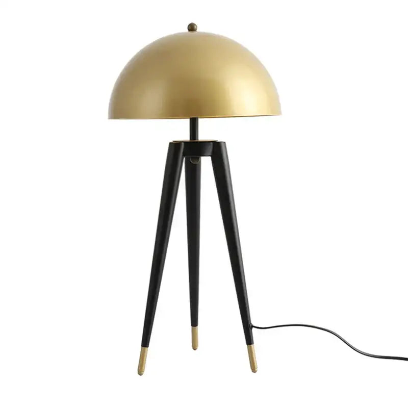 Brass and black coyote gold tripod floor lamp for living room
