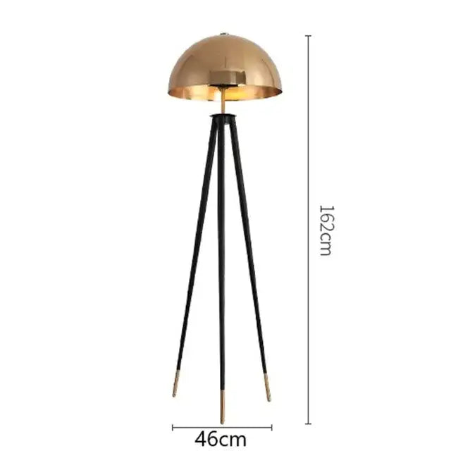Brass and black coyote gold tripod floor lamp for living room