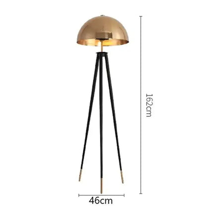 Brass and black coyote gold tripod floor lamp for living room