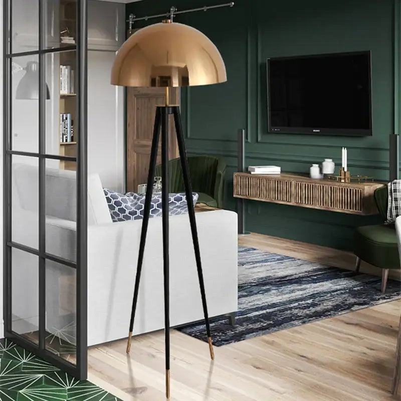 Brass and black coyote gold tripod floor lamp for living room