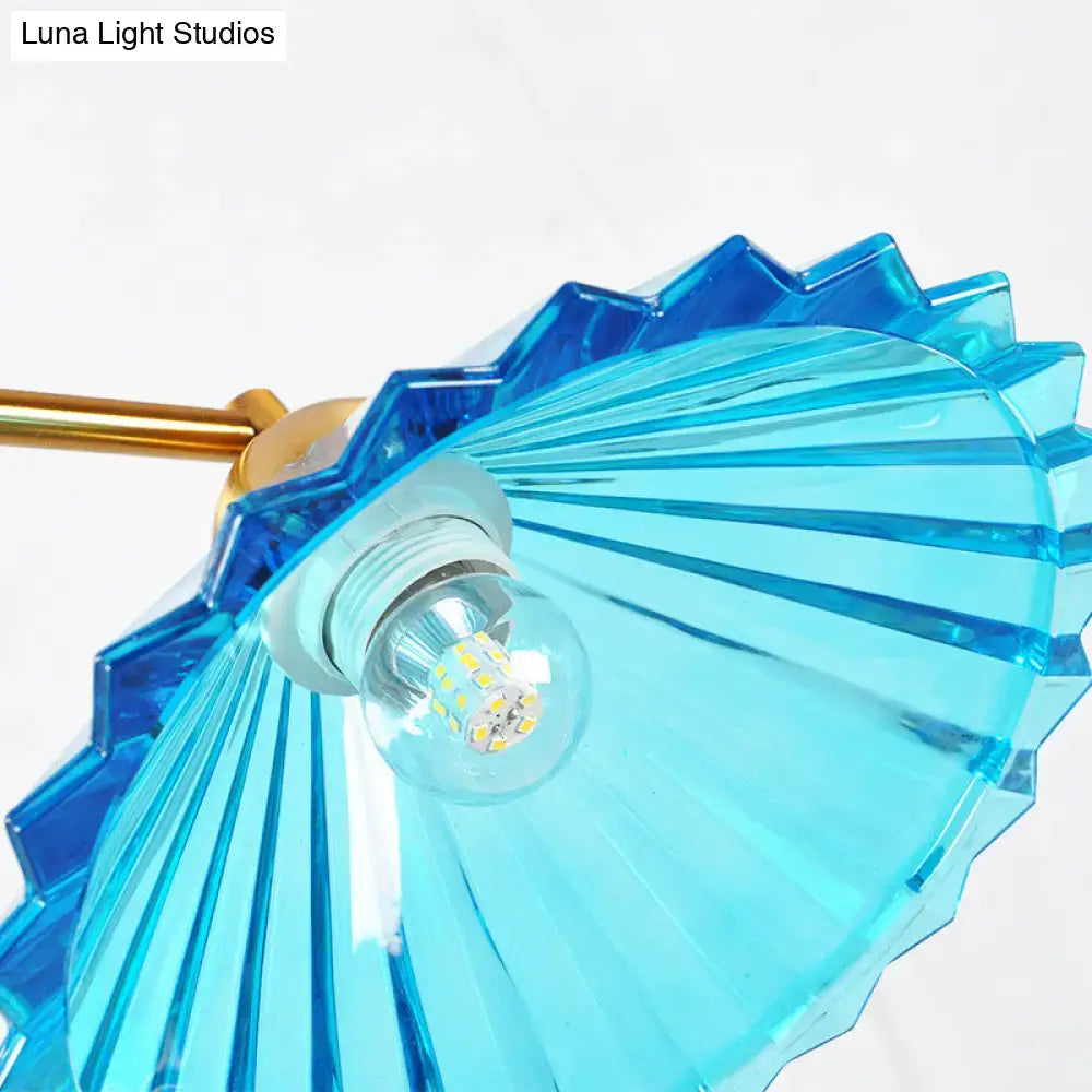 Brass & blue ribbed glass cone 3 light pendant – dining room