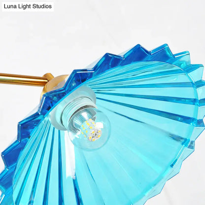 Brass & blue ribbed glass cone 3 light pendant – dining room