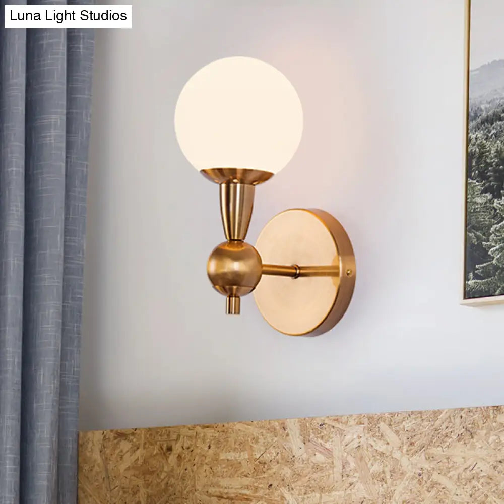 DecorBites™ Brass Orb Wall Mount Light with Opal Glass Lampshade - Mid Century Wall Lighting Idea