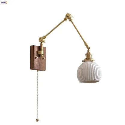 Brass walnut wall light with ribbed glass shade for bedroom