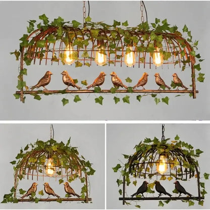 Bronze birdcage pendant lights with garland for dining room