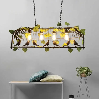 Bronze birdcage pendant lights with garland for dining room
