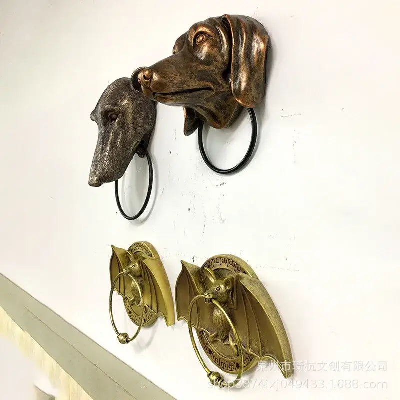 Bronze dog and bat head door knocker – courtyard wall pendant