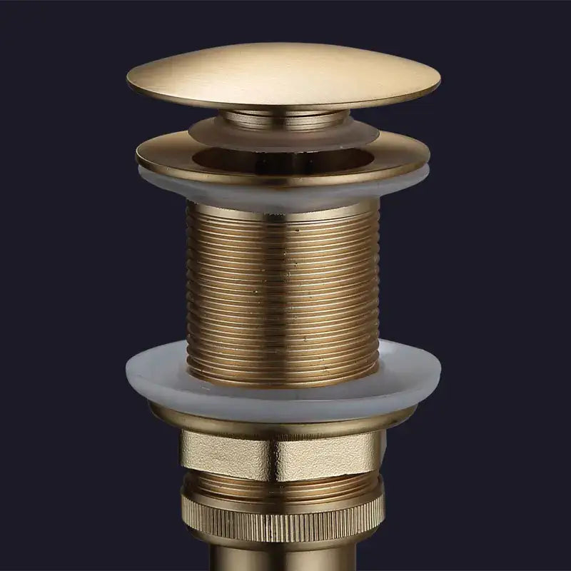 Brushed gold and white ceramic bathroom sink drain assembly kit