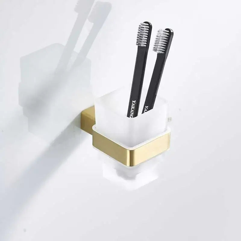 Brushed gold and white stainless steel bathroom accessory set
