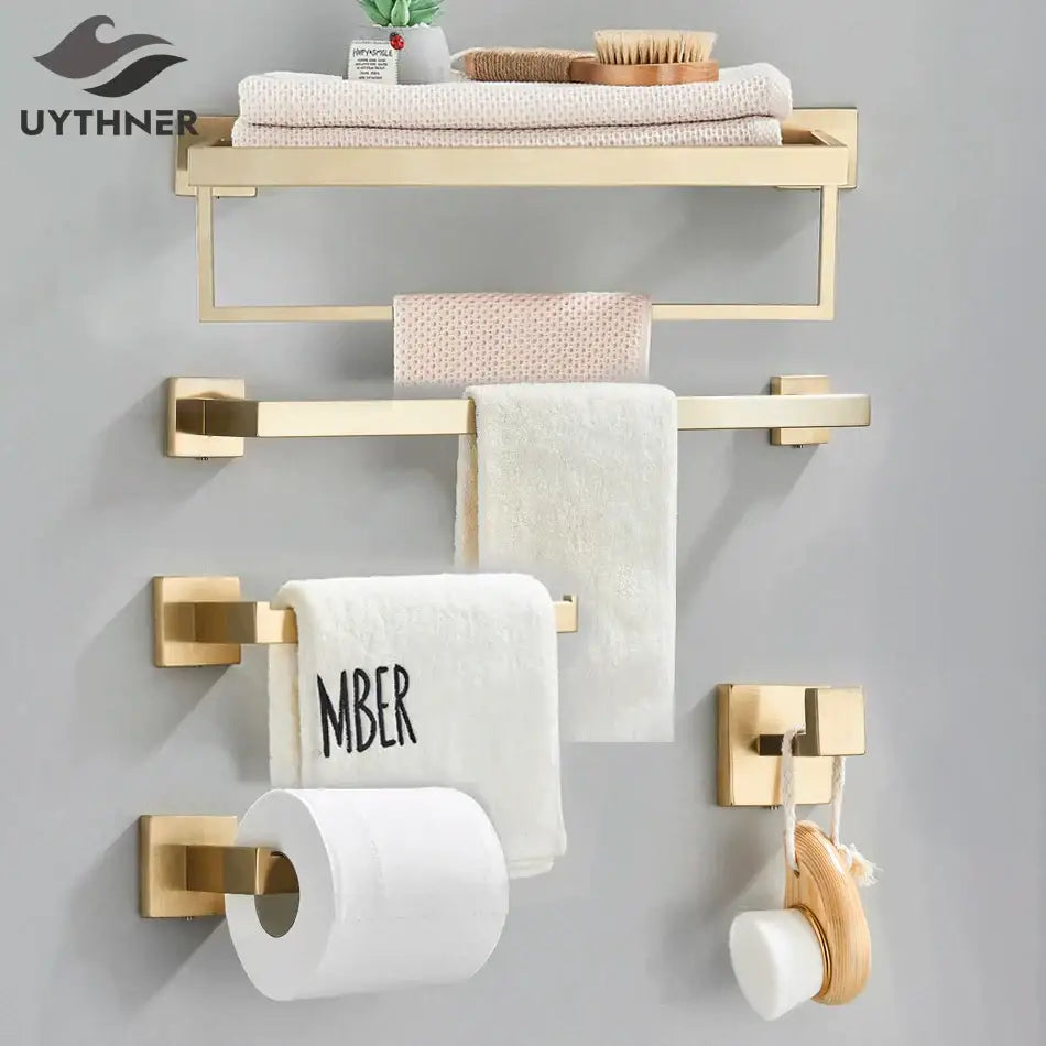 Brushed gold bathroom towel rack set with multi bar shelf and hooks