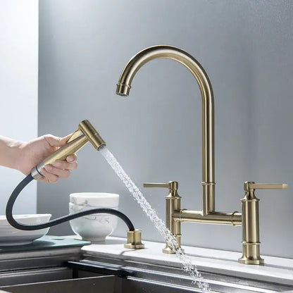 Brushed gold kitchen bridge faucet with hand shower head