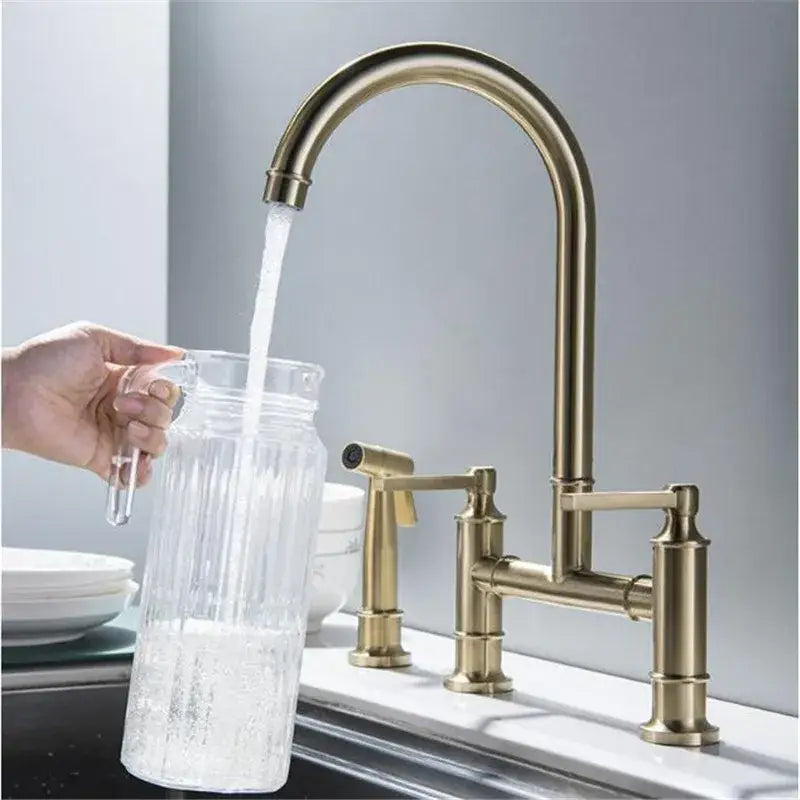 Brushed gold kitchen bridge faucet with hand shower head