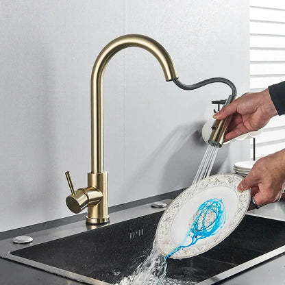 Brushed gold kitchen faucet with high arc pull down spray head