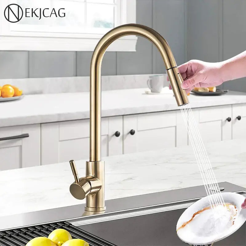 Brushed gold kitchen faucet with high arc pull down spray head