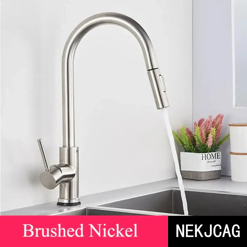 Brushed gold kitchen faucet with high arc pull down spray head