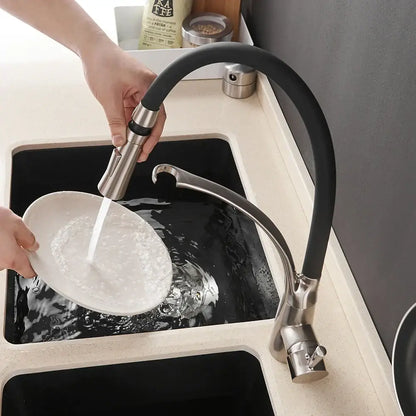 Brushed nickel and black kitchen sink faucet with pull down spray