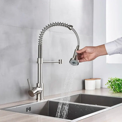 Brushed nickel coiled spring kitchen faucet with pull down sprayer