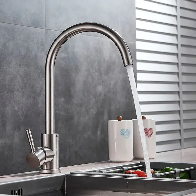 Brushed nickel kitchen faucet with curved swivel spout