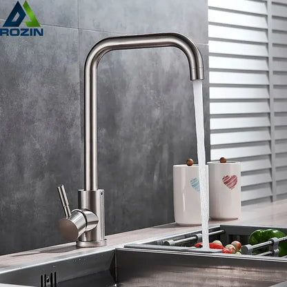 Brushed nickel kitchen faucet with curved swivel spout