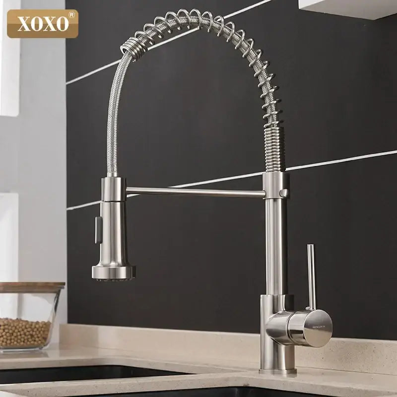 Brushed nickel kitchen faucet with pull down coiled gooseneck spout