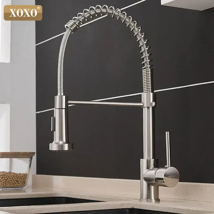 Brushed nickel kitchen faucet with pull down coiled gooseneck spout