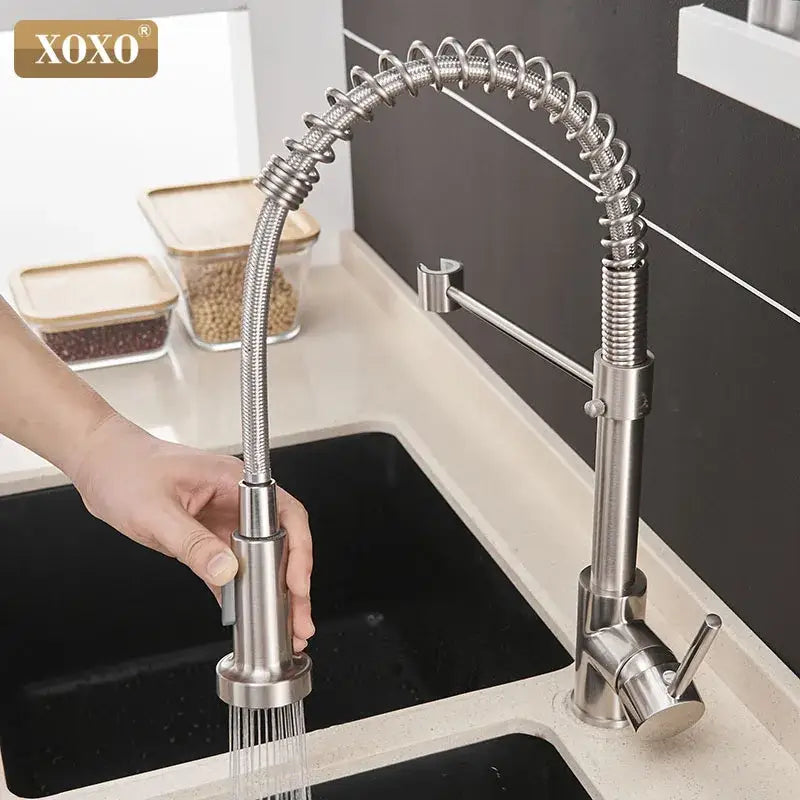 Brushed nickel kitchen faucet with pull down coiled gooseneck spout