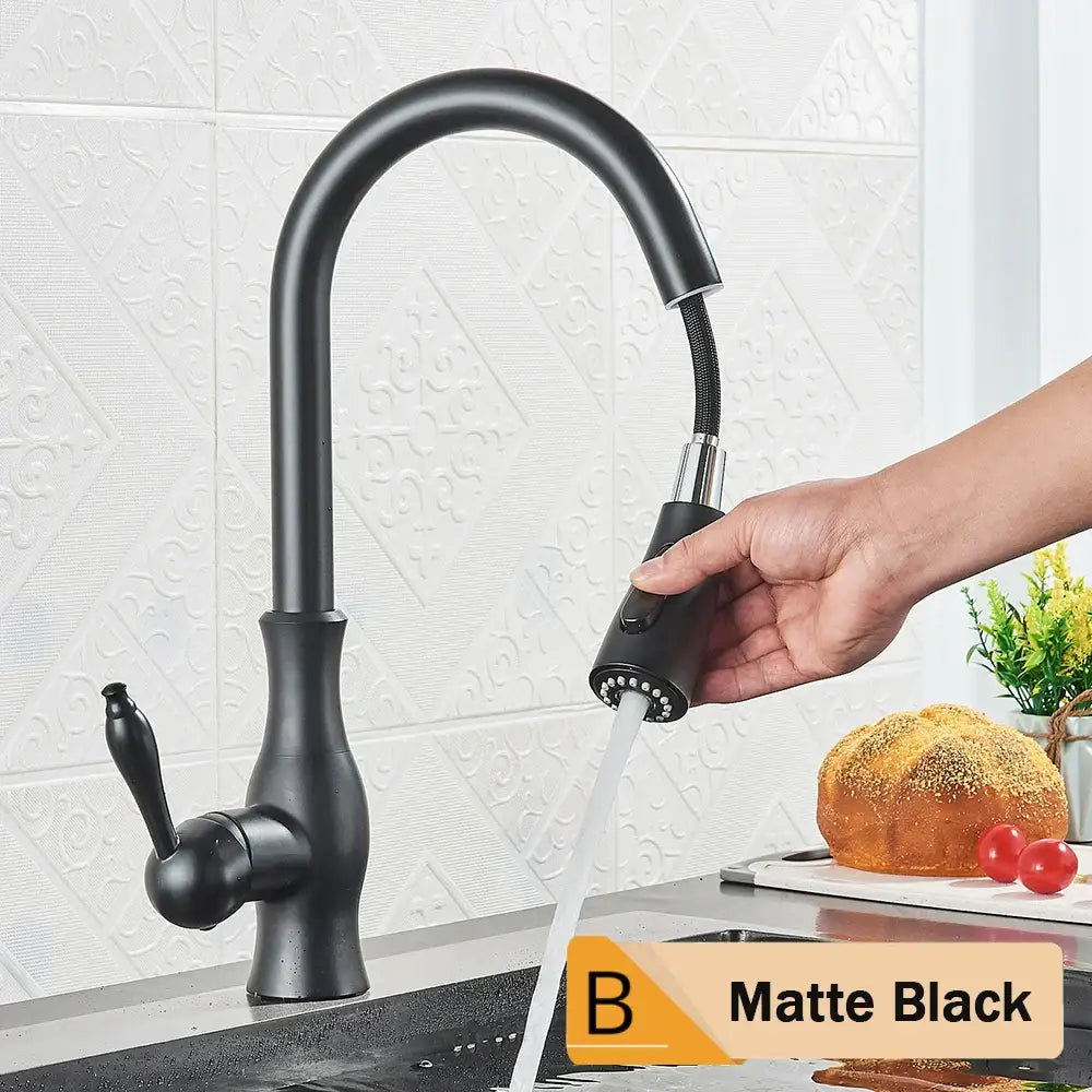 Brushed nickel kitchen faucet with pull down sprayer