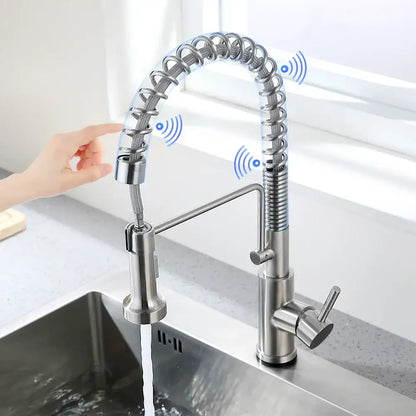 Brushed nickel sensor kitchen faucet with flexible pull down spray