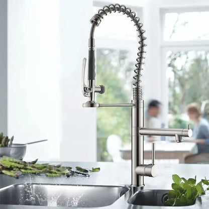 Brushed nickel spring kitchen faucet with pull down spray head