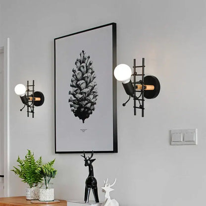 Cartoon matchstick man wall lamp black metal sconce for kids room