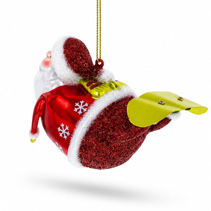 Santa Snowboarding Glass Christmas Ornament