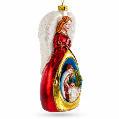 Guardian Angel over Nativity Glass Christmas Ornament