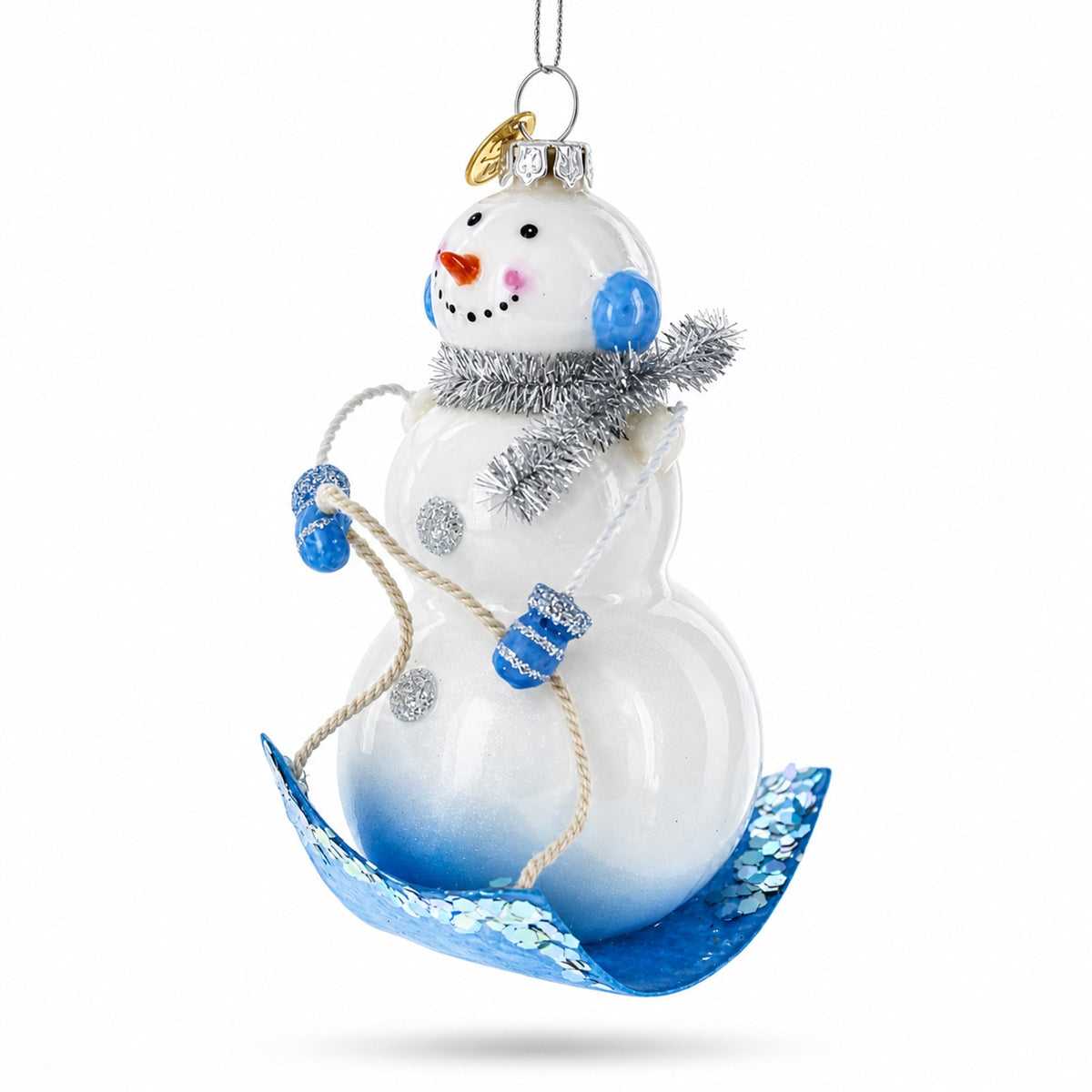 Snowman Riding a Sled Glass Christmas Ornament
