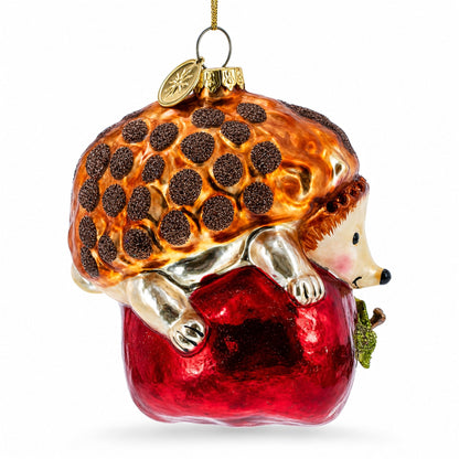 Hedgehog Savoring a Red Apple Glass Christmas Ornament