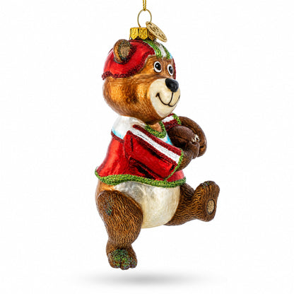 Bear Engaged in Football Glass Christmas Ornament