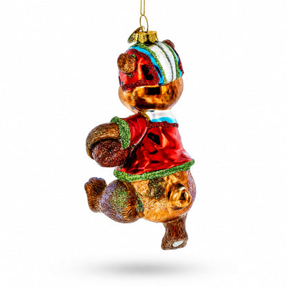 Bear Engaged in Football Glass Christmas Ornament