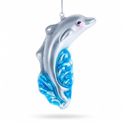 Dolphin Riding the Wave Glass Christmas Ornament