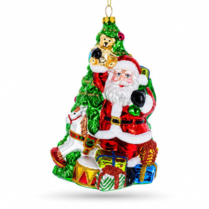 Santa’s Toyland Under the Tree Glass Christmas Ornament