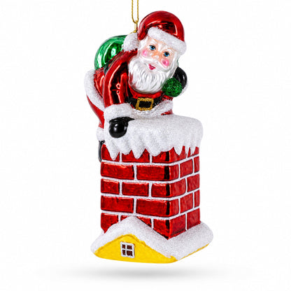 Santa Going Down the Chimney Glass Christmas Ornament