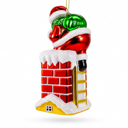 Santa Going Down the Chimney Glass Christmas Ornament