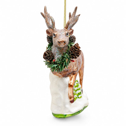 Reindeer with Pine Garland and Snowy Trees Glass Christmas Ornament