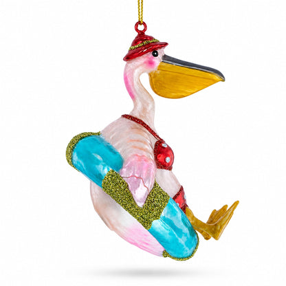 Pelican on Inflatable Ring Glass Christmas Ornament