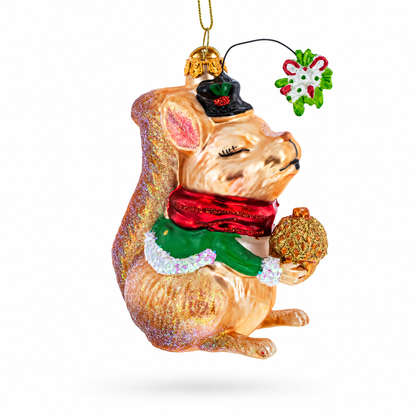 Squirrel Cradling an Acorn Glass Christmas Ornament