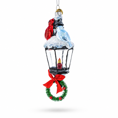 Red Cardinal Perched on Snow-Capped Lantern Glass Christmas Ornament
