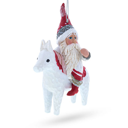 Santa Riding Horse Glass Christmas Ornament