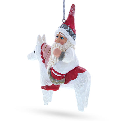 Santa Riding Horse Glass Christmas Ornament