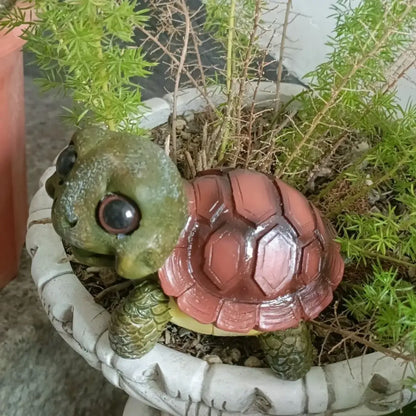 Charming green & pink crawling turtle sculpture garden decor