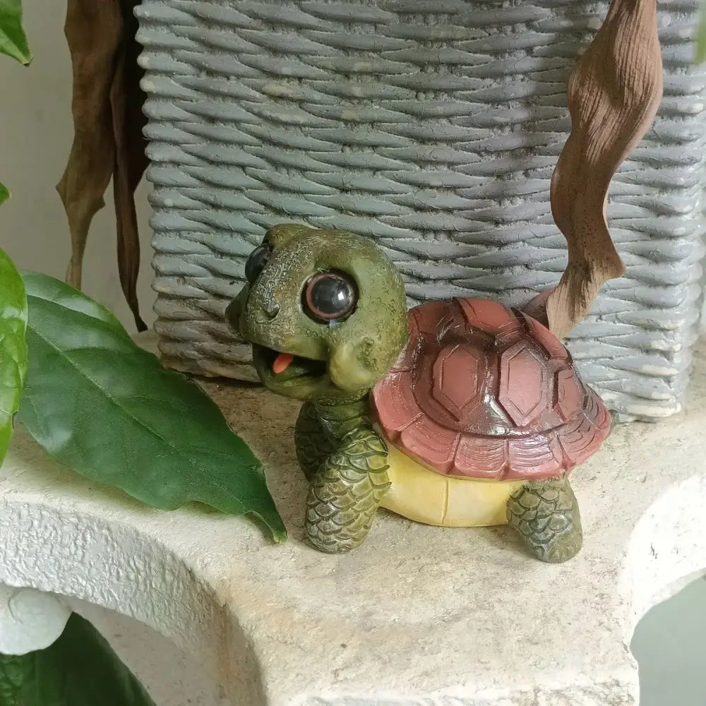 Charming green & pink crawling turtle sculpture garden decor