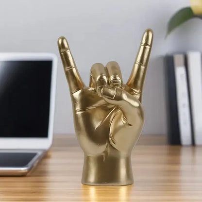 Chic black glossy rock hand gesture sculpture living room decor
