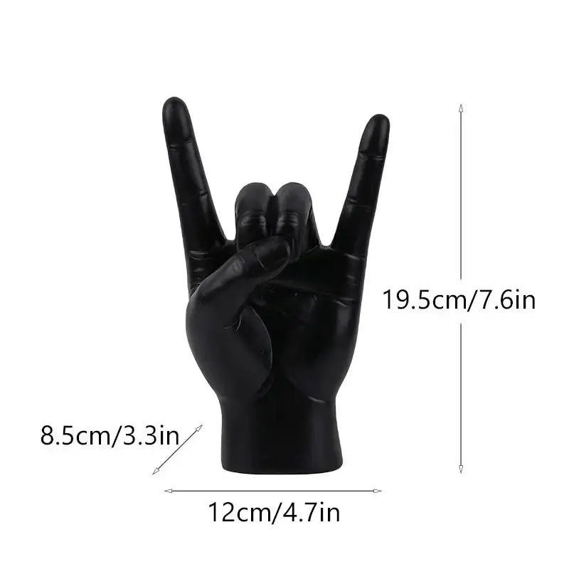 Chic black glossy rock hand gesture sculpture living room decor